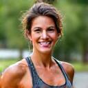 Portrait of Sarah, an active-looking woman in her late 30s.